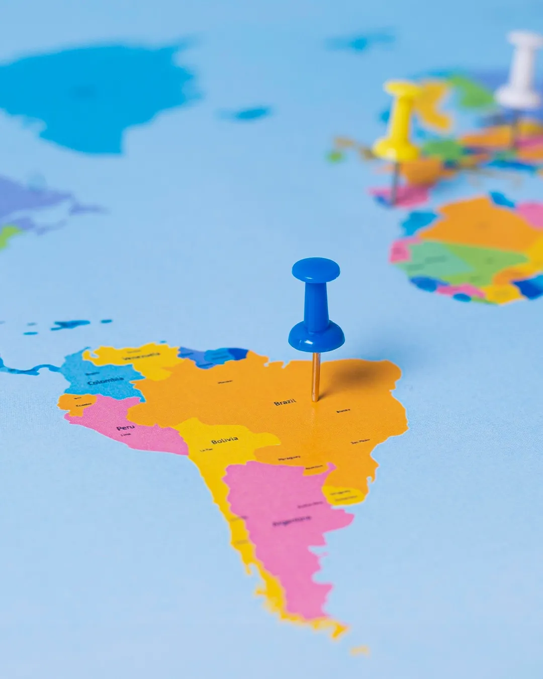 A vibrant panorama of Latin American landscapes and urban startup hubs, representing innovation across the continent