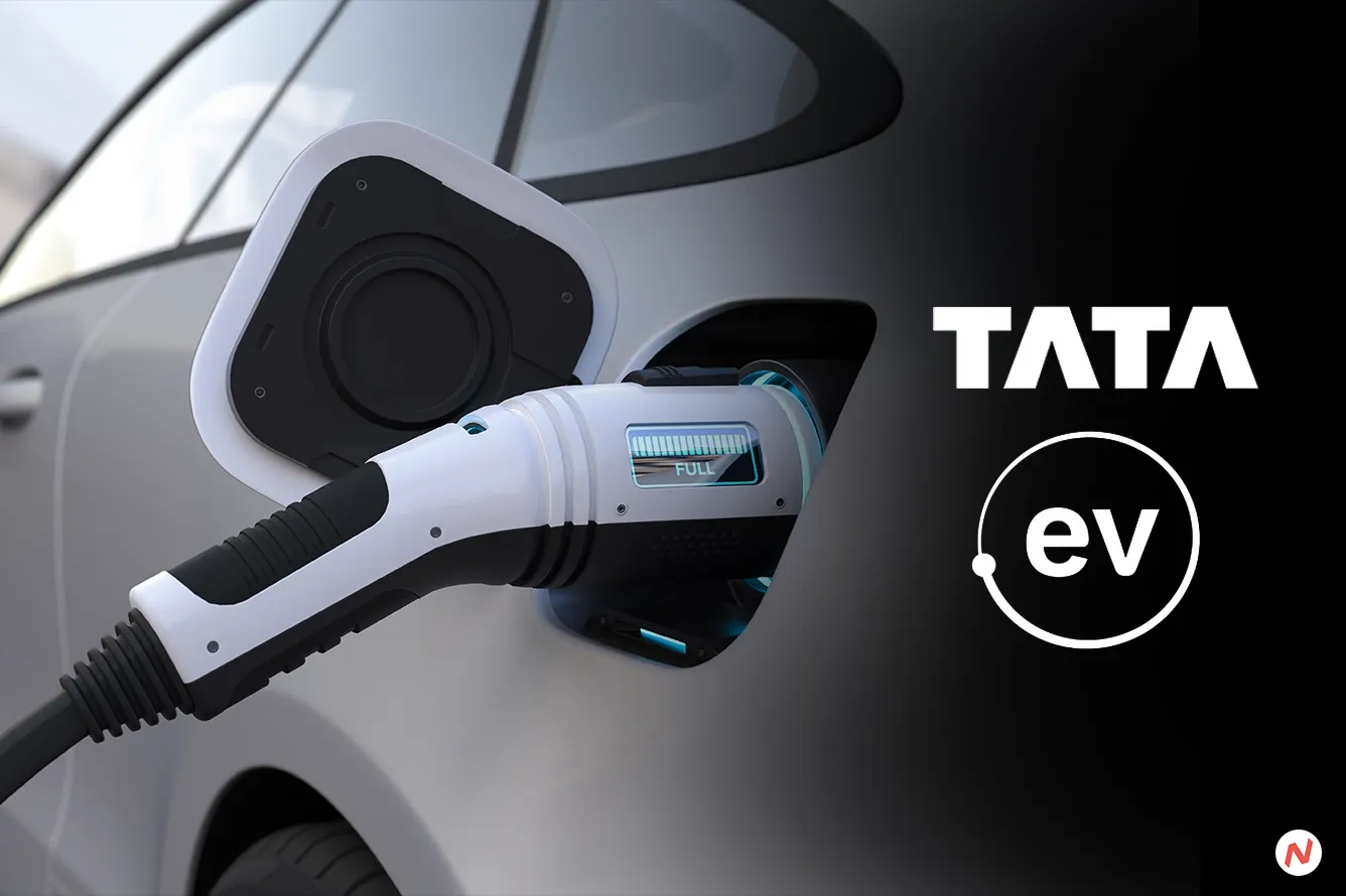Tata Motors Ace EV charging at a station, part of partnership with Delta Electronics and Thunderplus Solutions.