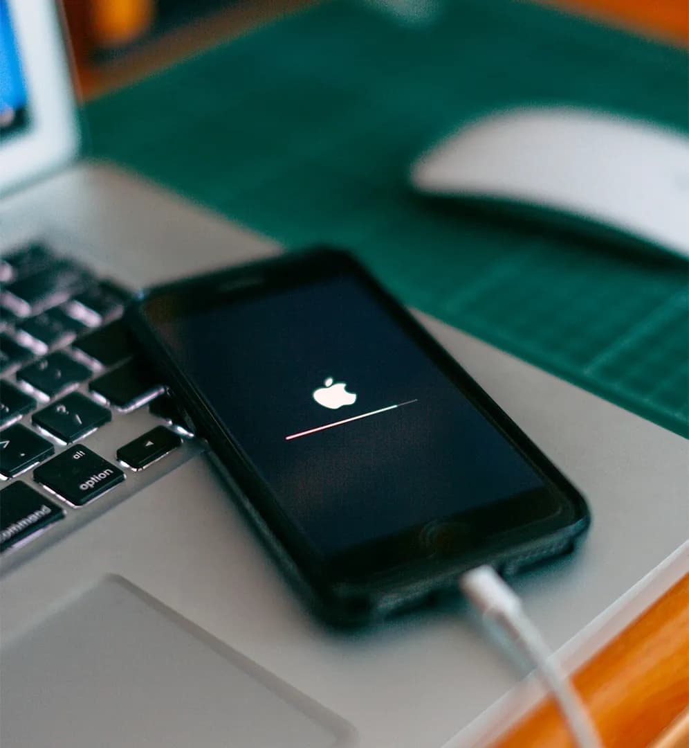 Apple iOS 17.4 update with Copilot, YNAB, and Monarch logos for real-time Apple finance tracking