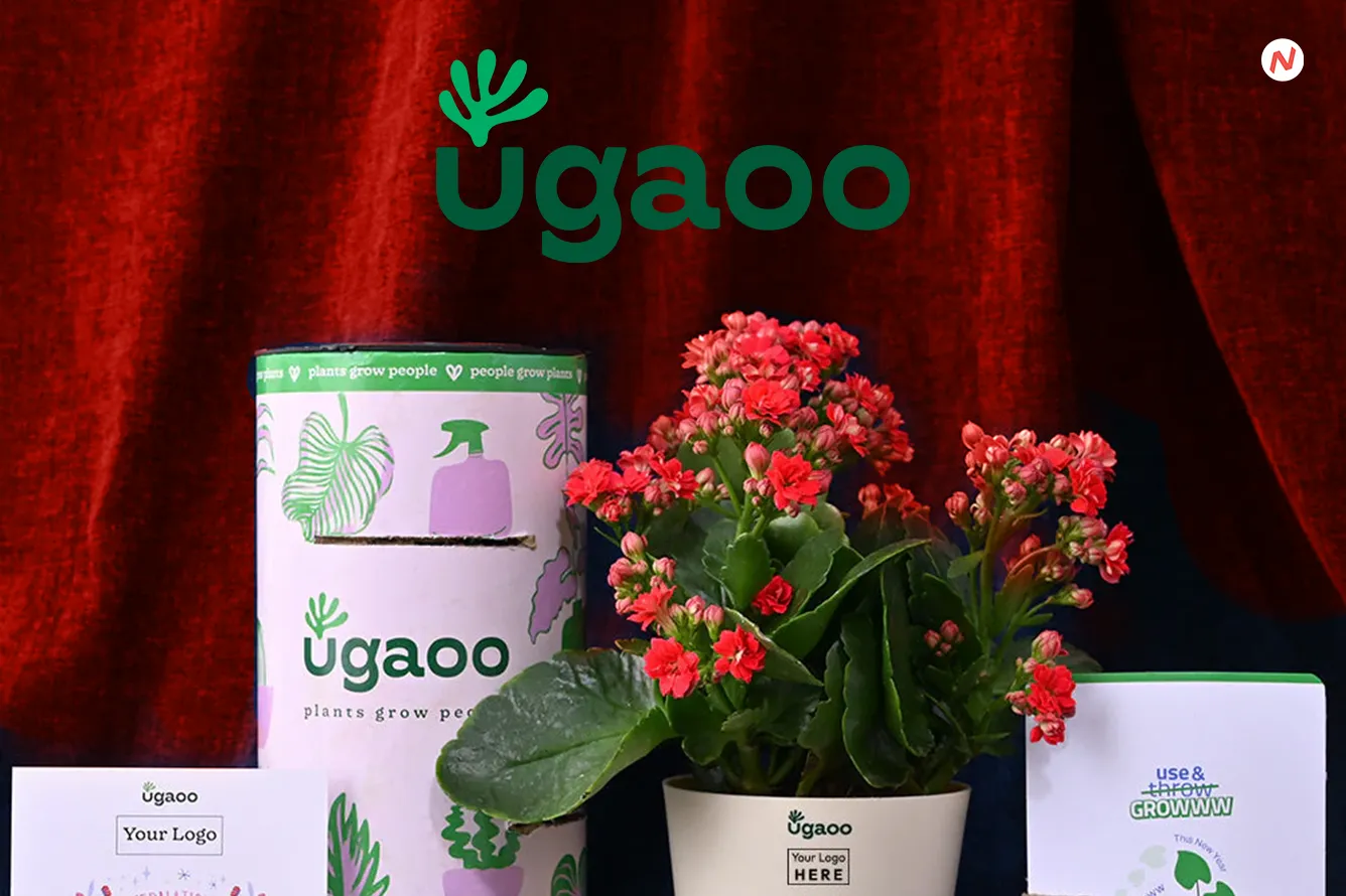 Ugaoo founders Siddhant Bhalinge and Saurabh Sameer with various plants and gardening supplies