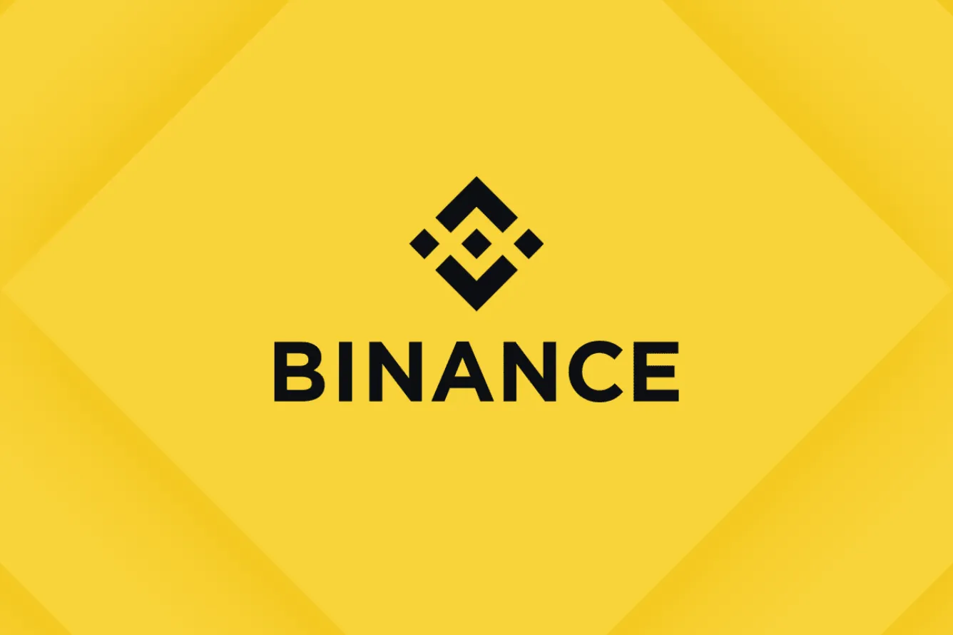 The Binance logo next to the India flag, representing its resumed operations in India