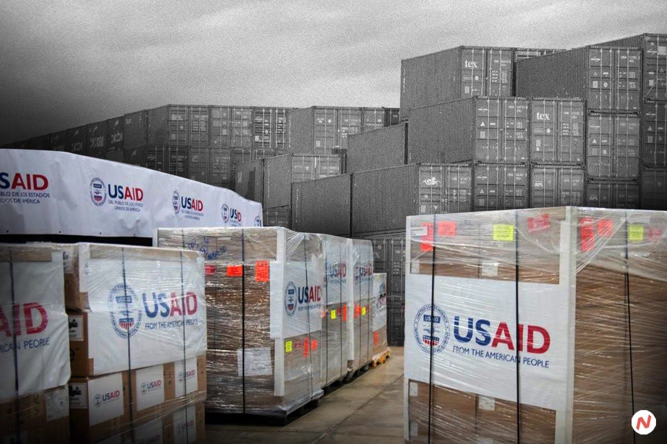 Medical supply containers and drugs at a warehouse, stranded after U.S. foreign aid freeze.