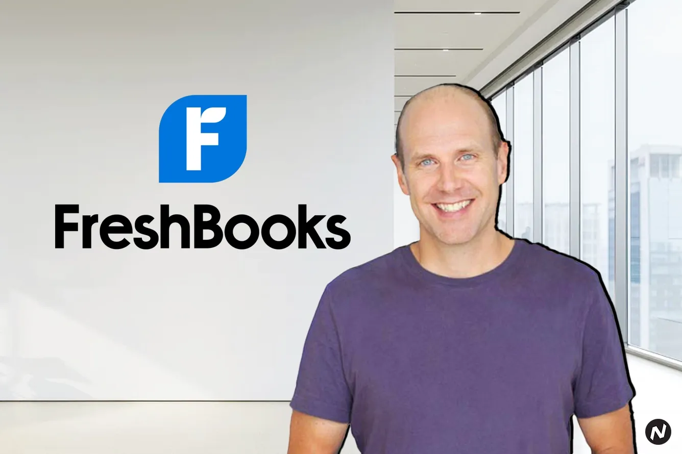 FreshBooks cloud-based accounting software interface on a laptop; the company secured $125M in debt financing from Morgan Sta