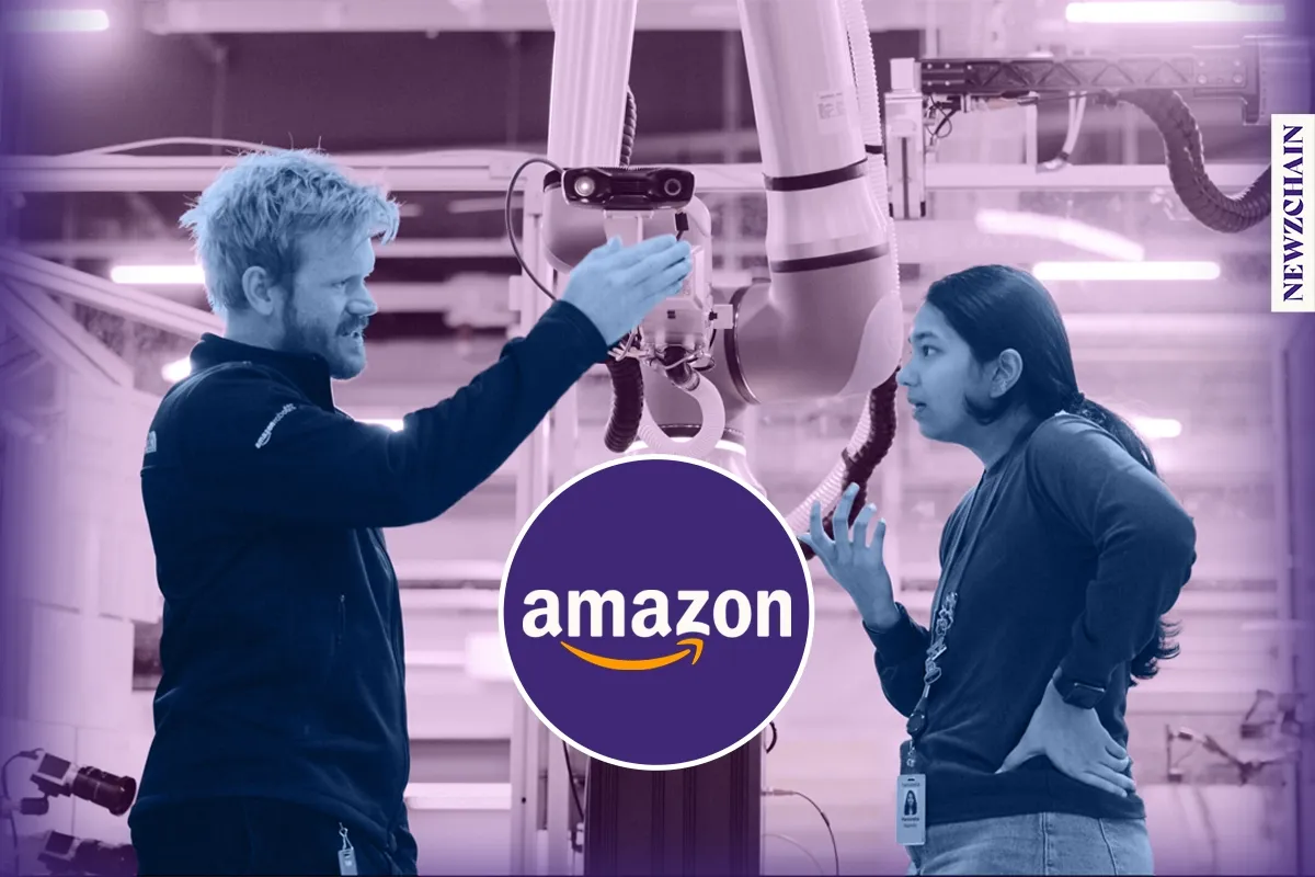 Amazon's Vulcan robot retrieving items from warehouse shelves to assist human workers